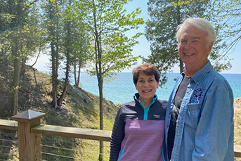 Emily Huling and husband John White. Link to their story